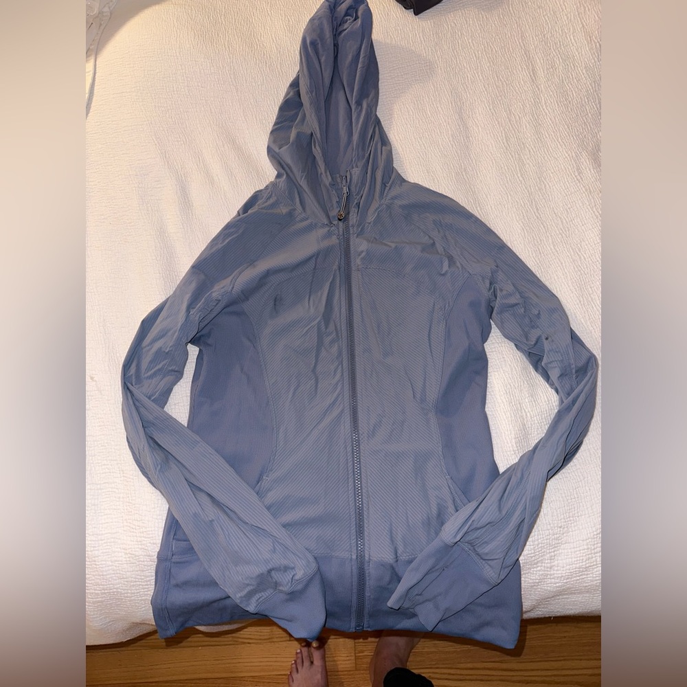 Lululemon size 10 blue jacket. Jacket is reversable. Lightly worn.